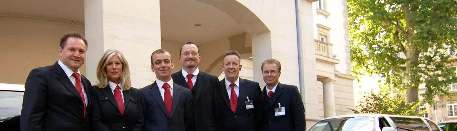 Security and chauffeur personnel from German Limousines.